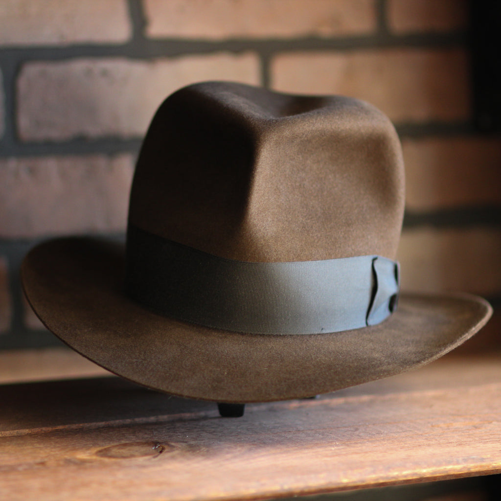 Handcrafted replica fedora modeled after the iconic hat worn by Harrison Ford as Indiana Jones.